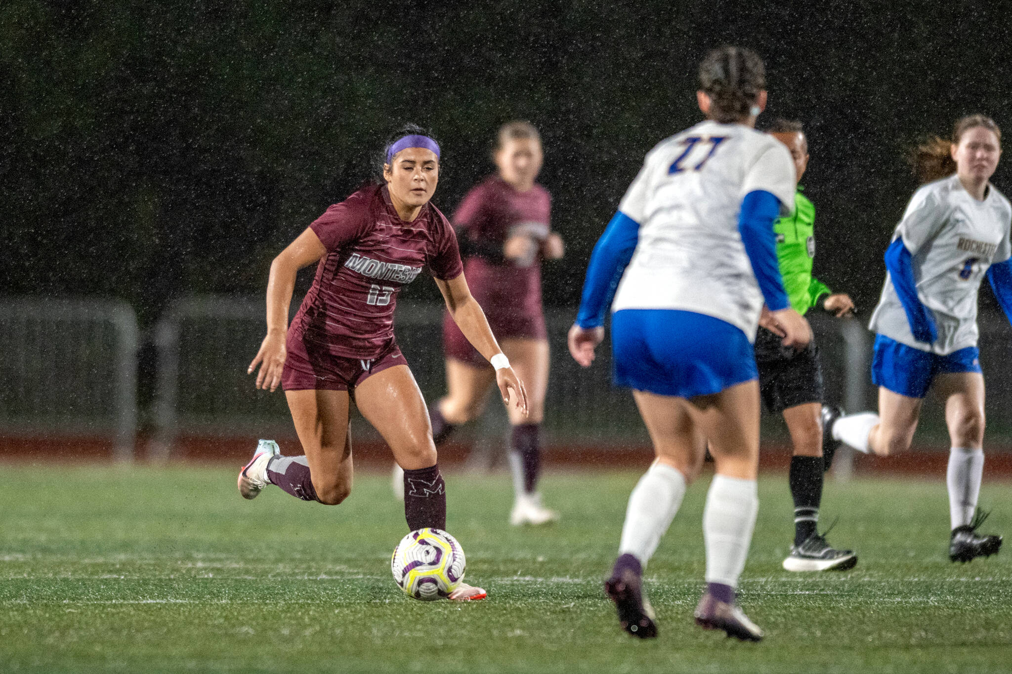 PHOTO BY FOREST WORGUM Montesano forward Jaelyn Butterfield (left) surveys the field during an 8-0 win over Rochester in a 1A District 4 Tournament semifinal game on Thursday at Montesano High School.