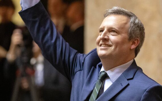 Ryan Berry / Washington State Standard
Washington state Commissioner of Public Lands Dave Upthegrove waves to the crowd during inauguration ceremonies at the Washington state Capitol, in Olympia, on Jan. 15.