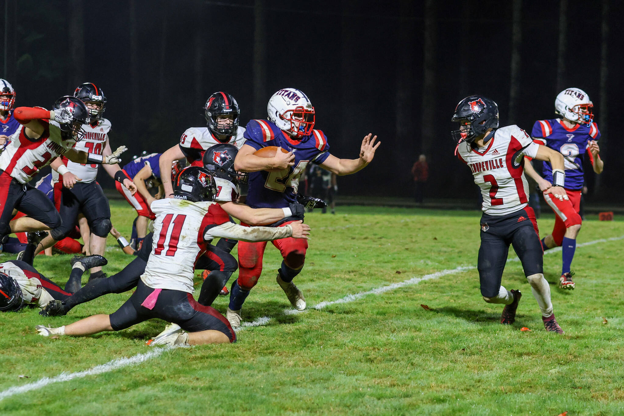 PHOTO BY LARRY BALE Pe Ell-Willapa Valley running back Lucas Lusk (24) carries the ball during a 48-14 victory over Coupeville in a 2B state-qualification game on Friday at Crogstad Field in Menlo.