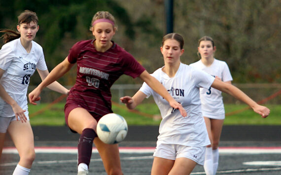 RYAN SPARKS | THE DAILY WORLD Montesano’s Lex Stanfield (10) competes for possession against Seton Catholic’s Addie Sahler during the Bulldogs’ 3-2 loss (5-4 on penalty kicks) in the 1A District 4 Championship on Saturday in Tenino.