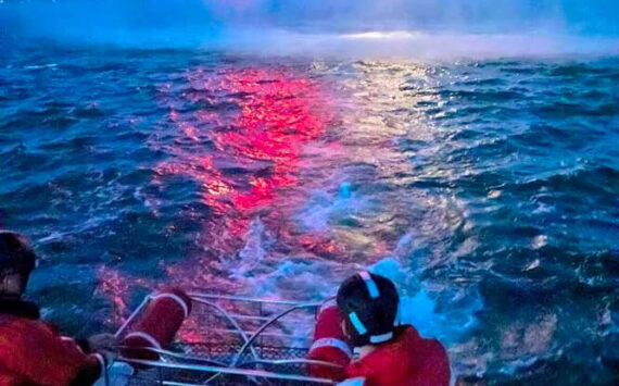 file photo 
USCG Station Cape Disappointment personnel rehearse a hoist-rescue exercise aboard a 47-foot motor lifeboat with a USCG Air Station Astoria MH-60 Jayhawk helicopter. USCG personnel put these skills to use Wednesday, Nov. 5, while rescuing a father and son from a precarious situation on the river.