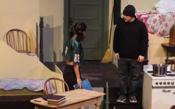 At the beginning of Act 2, Jasmine Jo Lock (Anne Frank) and David Bennett (Mr. Dussel) exchange words.