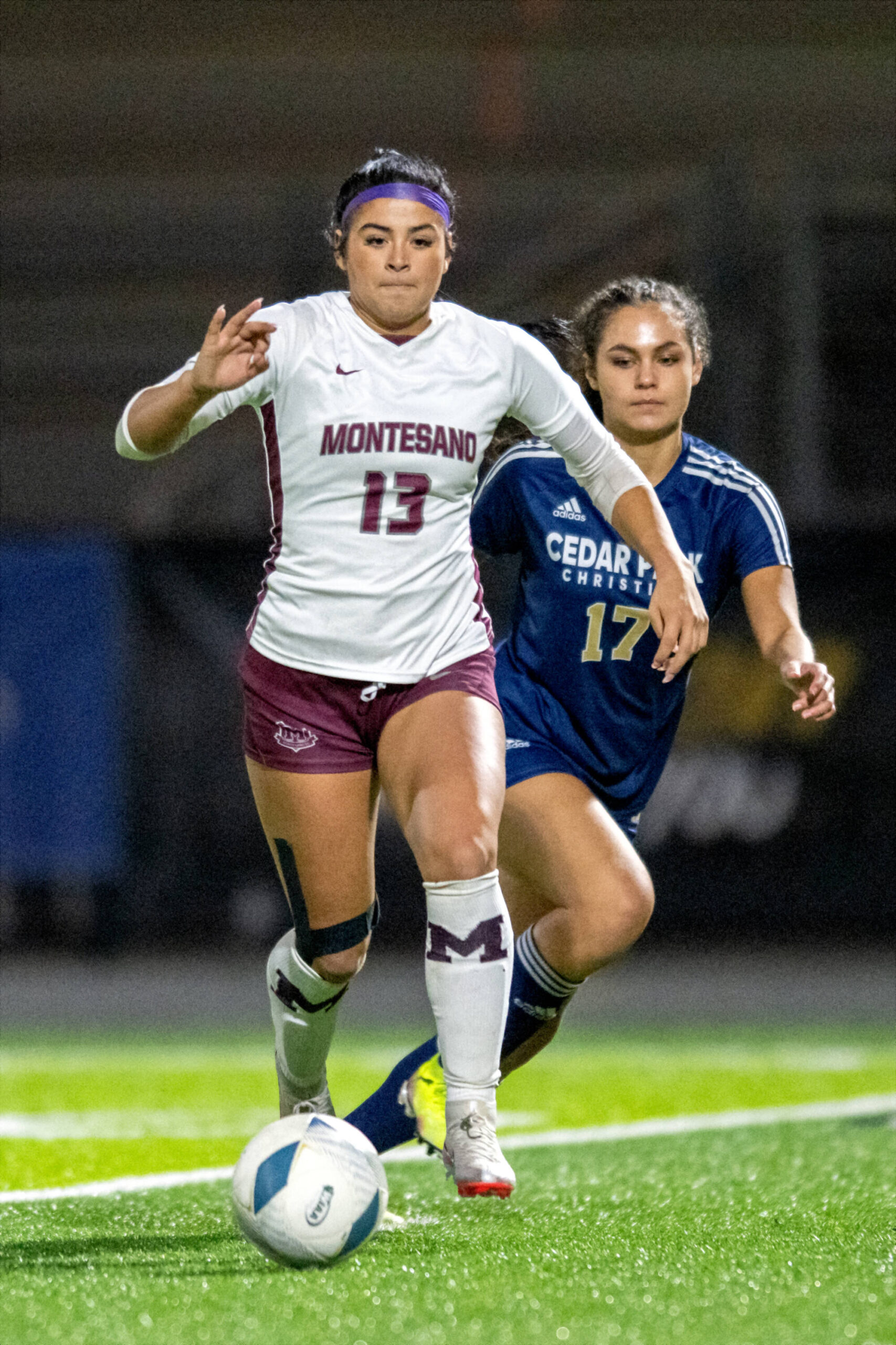 PHOTO BY FOREST WORGUM Montesano Jaelyn Butterfield (13) dribbles against Cedar Park Christians Mikah Thomas during a 5-0 loss in the 1A State Tournament Semifinals on Friday at the Federal Way Memorial Stadium.