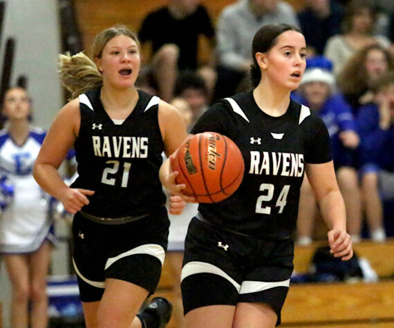 RYAN SPARKS | THE DAILY WORLD
Raymond-South Bend's Ava Stigall (24) brings the ball up the court flanked by teammate Kassie Koski during a 57-28 win over Elma on Thursday at Elma High School.