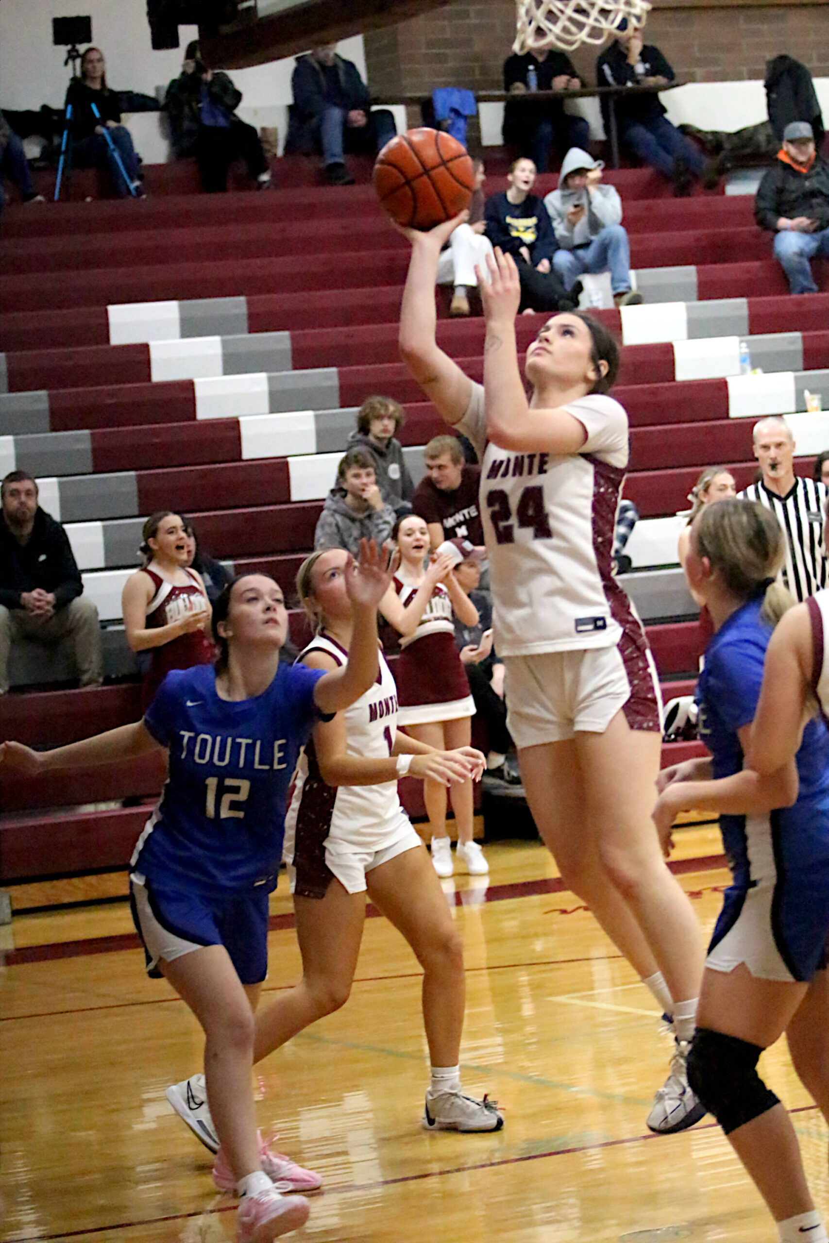 RYAN SPARKS | THE DAILY WORLD Montesano’s Jillie Dalan (24) scores two of her team-high 14 points during a 66-37 loss to Toutle Lake on Monday at Montesano High School.