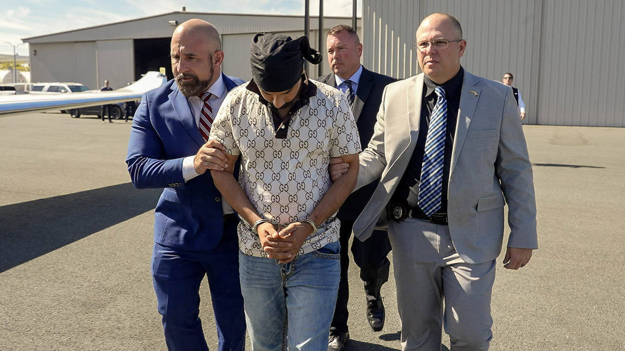 Florida Lt. Gov. Jay Collins
Florida Lt. Gov. Jay Collins, left, participates in the extradition from California of Harjinder Singh, accused of causing a crash that killed three people in Florida.