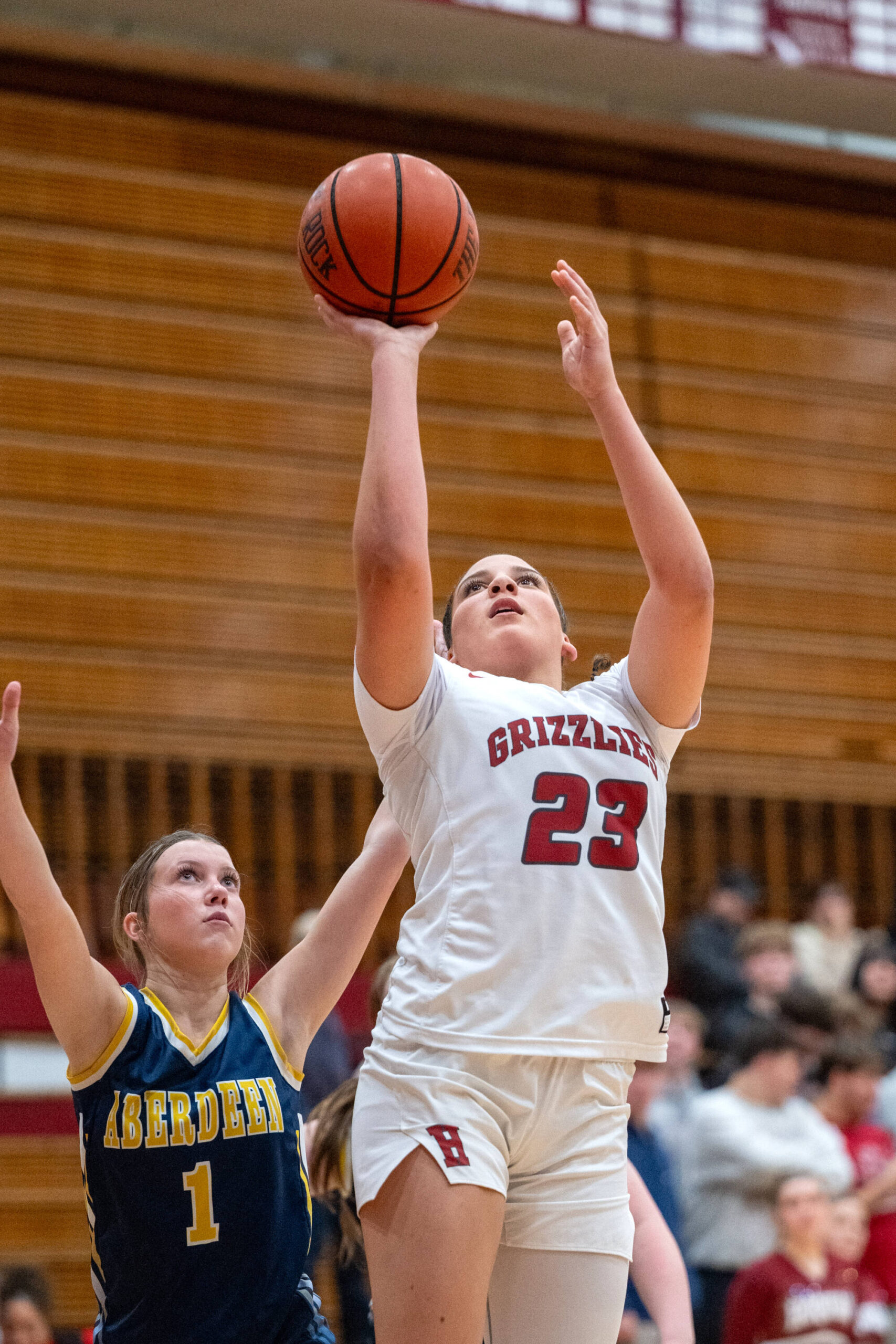 PHOTO BY FOREST WORGUM Hoquiam sophomore Aaliyah Kennedy (23) shoots while defended by Aberdeen’s Sophia Knutson during the Grizzlies’ 59-36 win on Thursday in Hoquiam. Kennedy had a game-high 22 points in the victory.