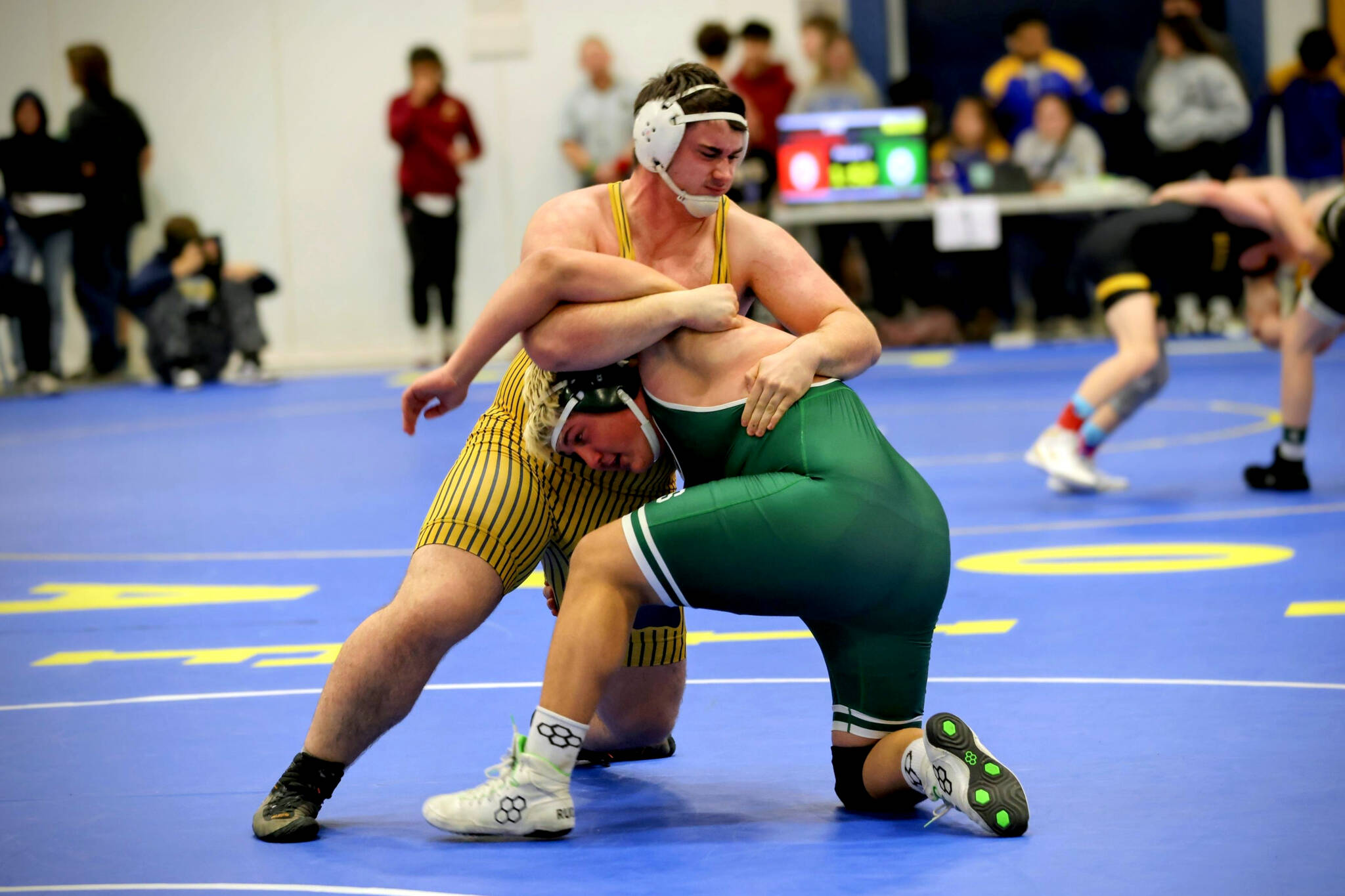 ERICA MCCRORY | MCCRORY PHOTOGRAPHY Aberdeens Landon Hamblin (top) gains control over Port Angeles Michael Willhelm during the 285-pound final at the Larry Brown Invitational on Saturday at Fife High School.