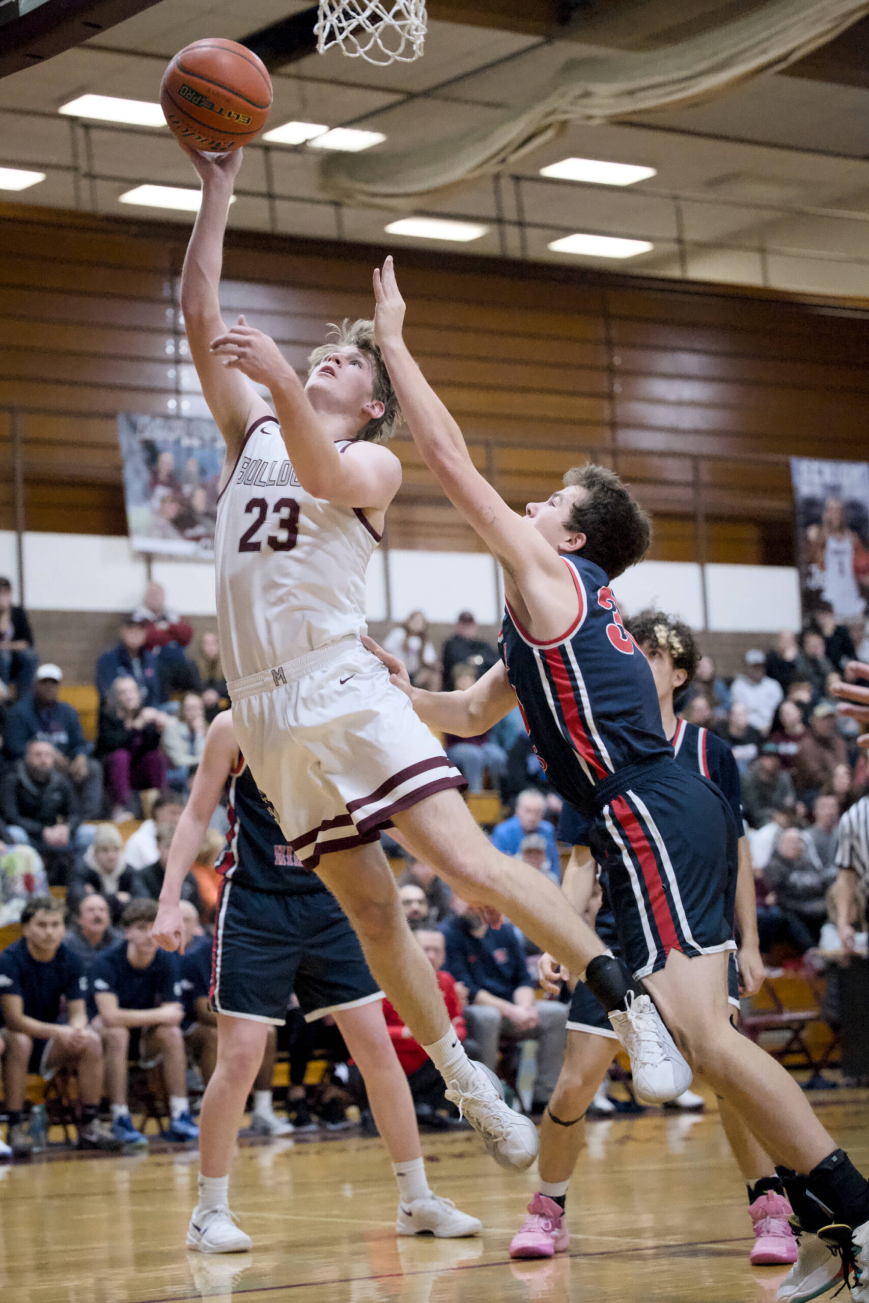 PHOTO BY FOREST WORGUM Montesanos Caden Grubb (23) scores two of his game-high 25 points in an 81-72 loss to Black Hills on Monday at Bo Griffith Memorial Gymnasium in Montesano.
