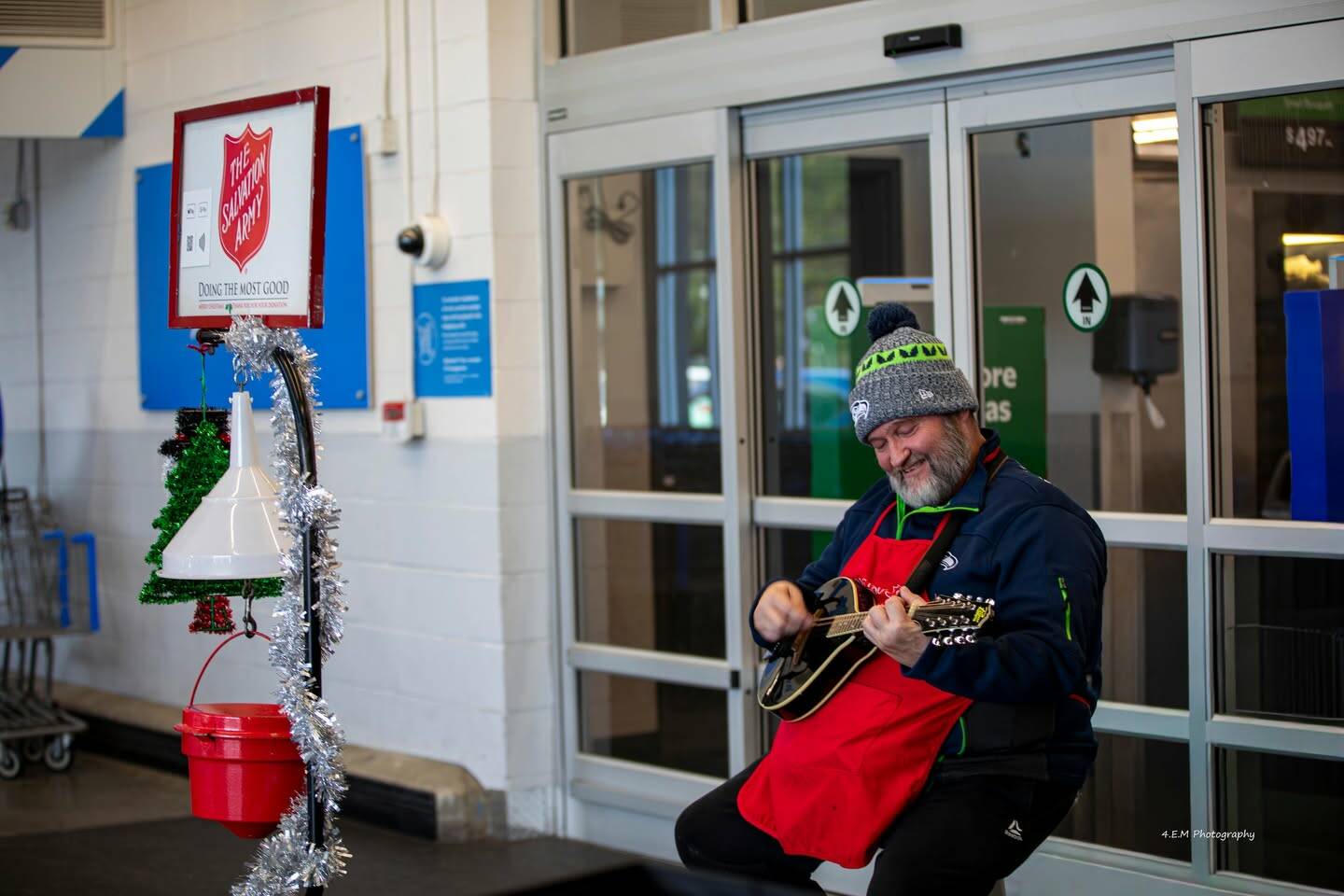 4-Ever Moments Photography
Silver Steele plays guitar while outside of Safeway in Aberdeen as he raises money for the Salvation Army, his 14th year doing so.