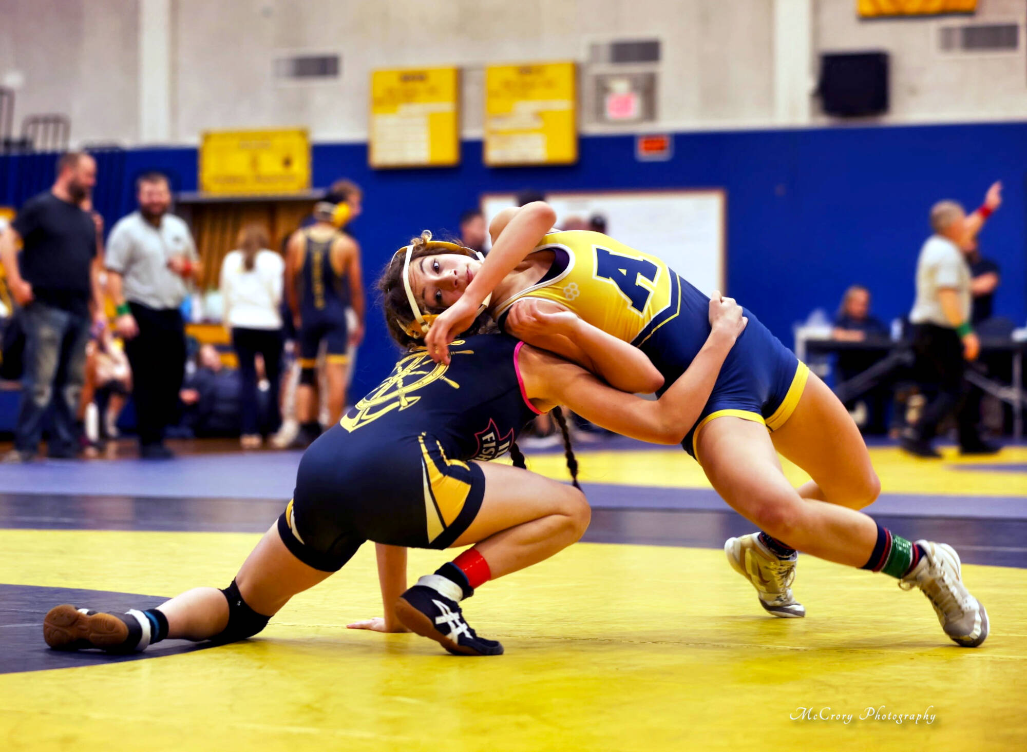 ERICA MCCRORY | MCCRORY PHOTOGRAPHY Aberdeens Xela Kowoosh (right) wrestles against Ilwacos Ophelia Wise during a 125-pound match at the Grays Harbor Championships on Saturday in Aberdeen.