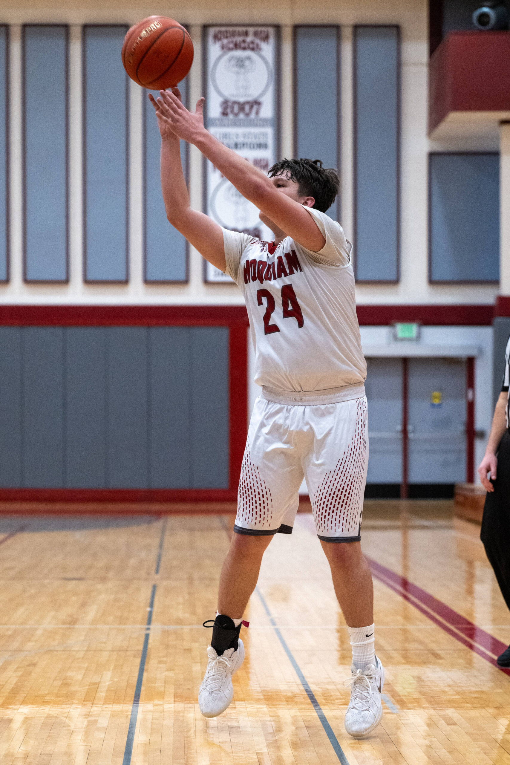 PHOTO BY FOREST WORGUM Hoquiam guard Lincoln Niemi hits one of his six 3-pointers to surpass 1,000 points for his prep career during a 69-52 win over Steliacoom on Saturday at Hoquiam Square Garden.