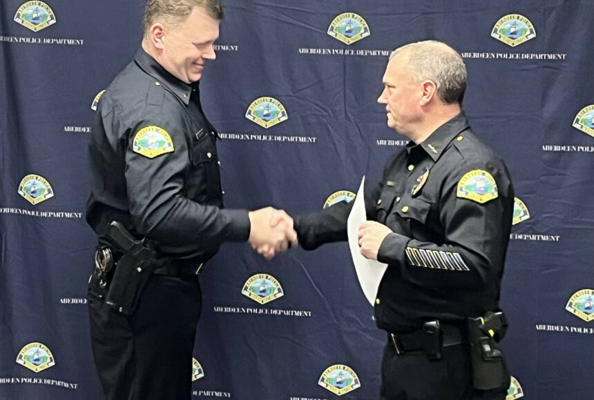 <p>APD photo</p>
                                <p>Aberdeen Police Chief Dale Green congratulates Gary Sexton on his promotion to the rank of lieutenant.</p>