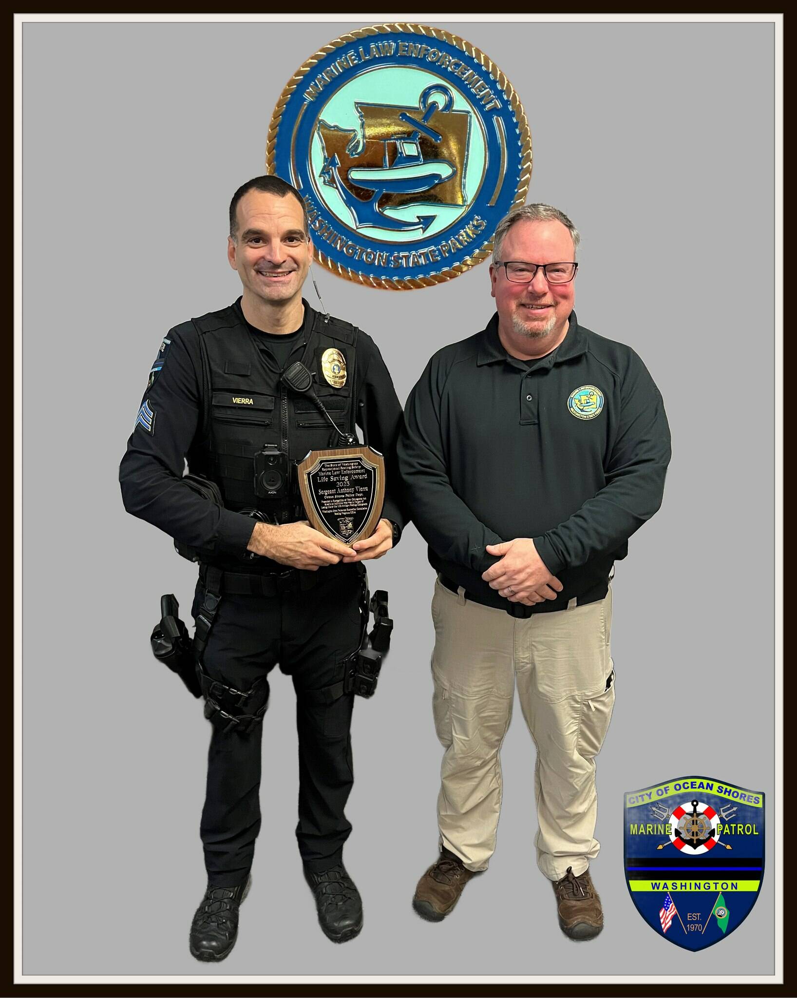 Ocean Shores Police Sergeant Tony Vierra (left) recently received the Recreational Boating Safety Life Saving Award. (Ocean Shores Police Department)