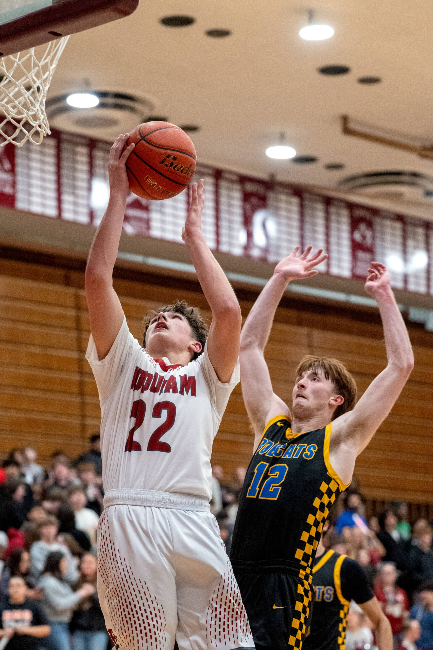 PHOTO BY FOREST WORGUM Hoquiams K.J. McCoy (22) puts up a shot against Aberdeens Gabe Matthews during the Grizzlies 69-60 win on Thursday at Hoquiam Square Garden.