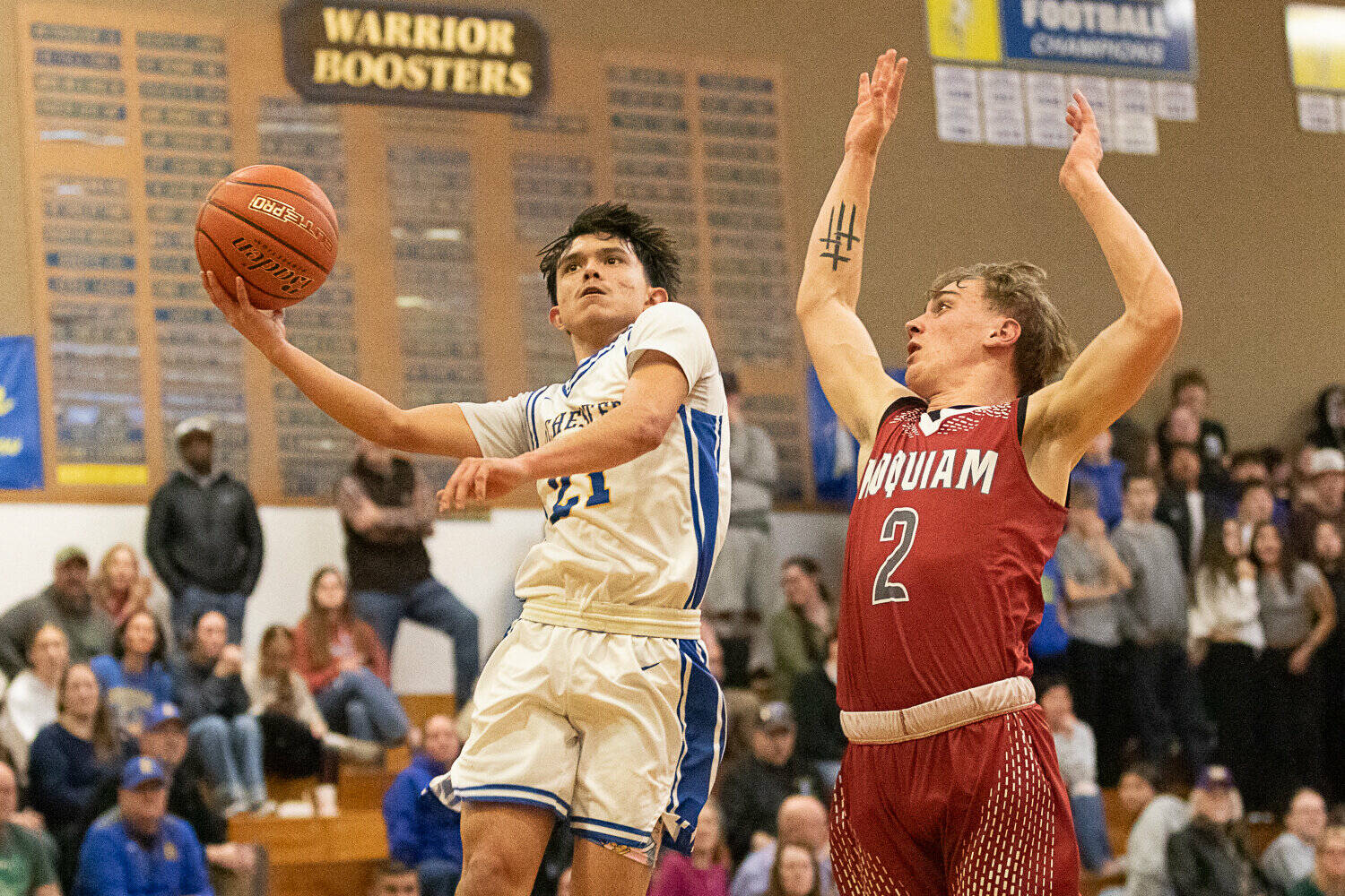 DYLAN WILHELM | THE CHRONICLE Hoquiams Ethan Byron (2) defends Rochesters Tyson Canales during the Grizzlies 52-40 win on Friday at Rochester High School.