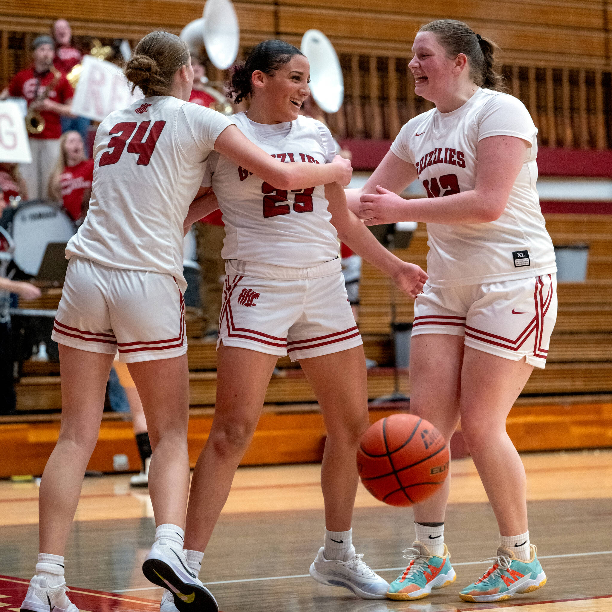 PHOTO BY FOREST WORGUM Hoquiams Aaliyah Kennedy (middle) is congratulated by teammates Makalah Haskey (43) and Sydney Gordon after scoring her ninth-straight point in the third quarter of a 35-28 win over Kings Way Christian in a 1A District 4 Tournament game on Friday at Hoquiam High School.