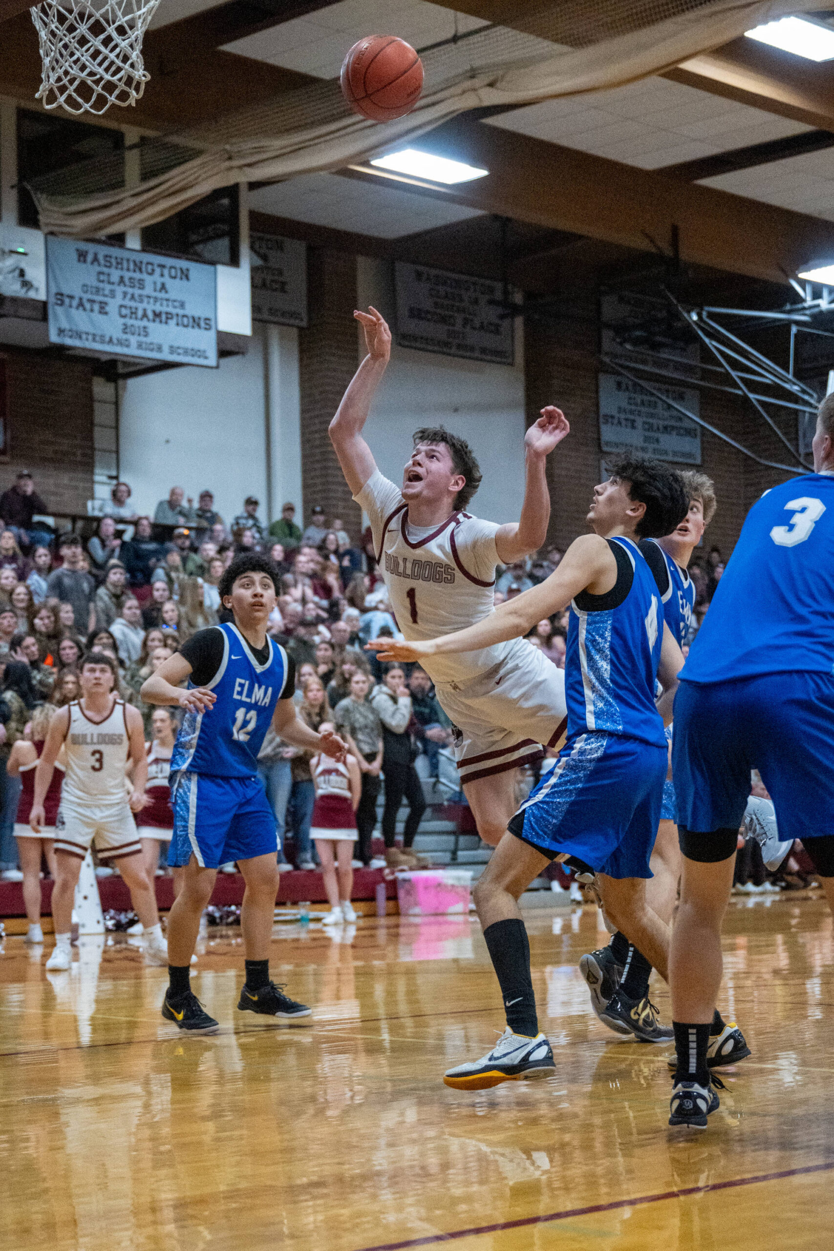 PHOTO BY FOREST WORGUM Montesanos Colton Grubb (1) is fouled on his way to the basket during a 57-45 victory over Elma in a 1A District 4 semifinal game on Tuesday at Montesano High School.