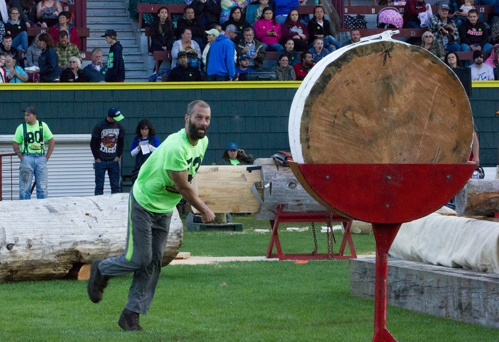 (Corey Morris | Grays Harbor Newspaper Group) Derek Such of Hoquiam leans forward in the follow through of his throw during the axe throw event for Loggers Playday at Olympic Stadium in Hoquiam.