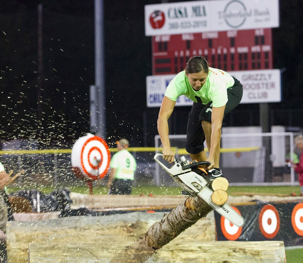 (Corey Morris | Grays Harbor Newspaper Group) Erin Lavoie of Spokane makes a cut during the obstacle pole event during the 52nd Loggers Playday on Sept. 10 in Hoquiam.