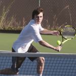 (Brendan Carl | The Daily World) Aberdeen&rsquo;s Ryan Solan plays a ball at the net during the Bobcats match with Chehalis. Solan rallied afer losing the first match to defeat Brandon Touhey, 4-6, 6-0, 6-1.