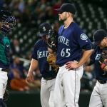 Rangers outlast Mariners, 10-7
