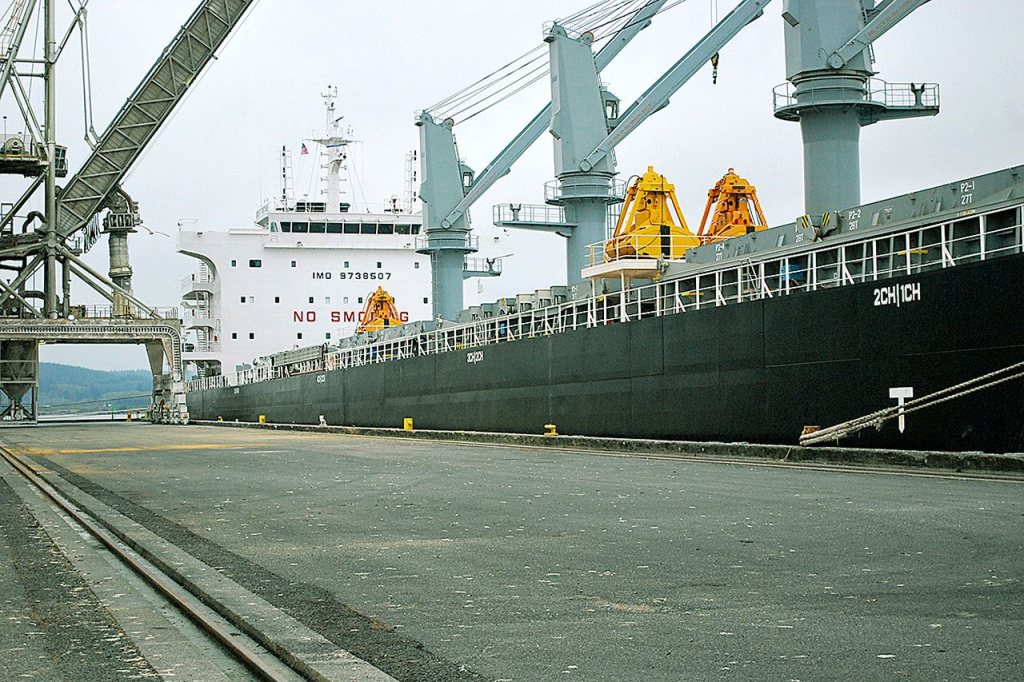 A 600-foot vessel docked at the Port of Grays Harbor awaits its cargo. Ships like this will be able to increase their payload 10 percent after the dredging project is finished. BOB KIRKPATRICK|THE DAILY WORLD