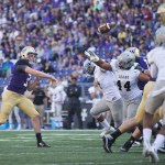 Unbeaten halfway through the season, Huskies already hearing Heisman and playoff talk