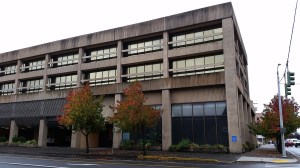 This office building at 101 E. Market St., in downtown Aberdeen is called the Seafirst building. An increasing number of homeless people have been congregating in its covered parking lot and nearby. (Terri Harber|The Daily World)
