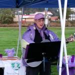 (Terri Harber/The Daily World) Sheranmarie Bachman sings Wednesday during the 4th Annual Domestic Violence Candle Light Vigil held Wednesday at at Zelasco Park in Aberdeen.