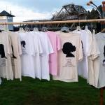 (Terri Harber/The Daily World) T-shirts hang with identities of domestic violence victims hang in Aberdeen&rsquo;s Zelasco Park on Wednesday. It was the site of the 4th Annual Domestic Violence Candle Light Vigil.