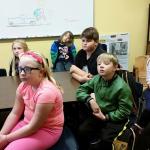 Students from Cosmopolis School listen to a presentation about India on Thursday by Maddy Shortt. They are designing a mural that will be influenced by that country&rsquo;s art and culture. (Terri Harber|The Daily World)