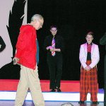 Grays Harbor College Theater Director Brad Duffy, wearing a red jacket, provides the actors direction during a Tuesday evening dress rehearsal of &ldquo;James and the Giant Peach.&rdquo; The actors, from left, are Natasha Williams-Brown, Chawndra Hicks, Riley Jackson and Adam Cooper. (Bob Kirkpatrick/The Daily World)