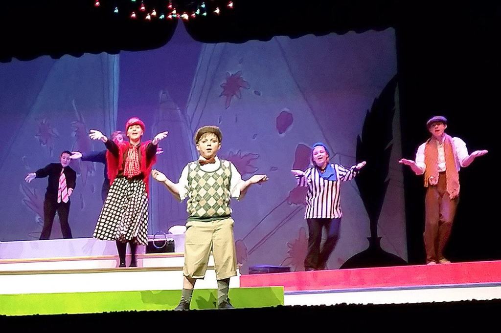 Sam Dorsch, center, portrays James in the Grays Harbor College production of &ldquo;James and the Giant Peach.&rdquo; The production opens Friday night and runs through Nov. 13. (Terri Harber/The Daily World)