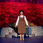 The abbey postulant Maria Ranier (Kendall Cavin) sings how &ldquo;the hills are alive with the sound of music&rdquo; as she heads to her first assignment at the von Trapp residence. (Photo by Keith Krueger)