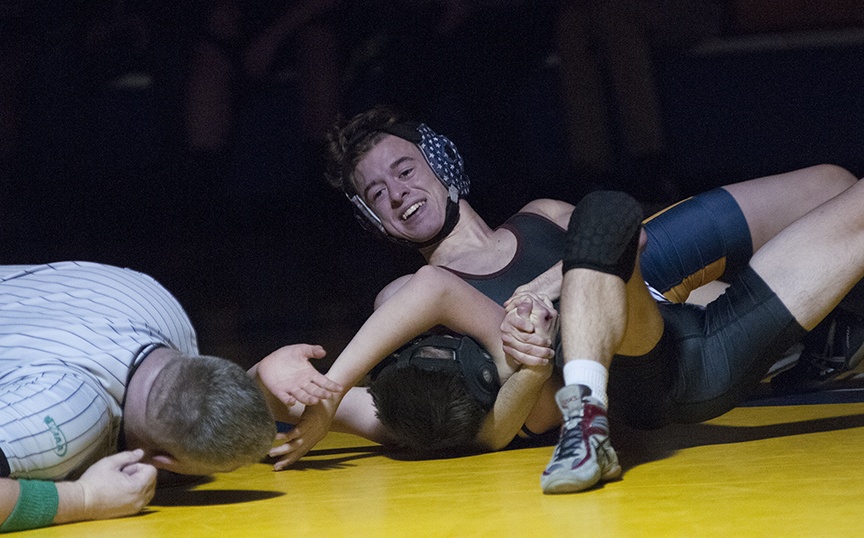 Hoquiam&rsquo;s Lutra Felton smiles as he settles in for a pin against Aberdeen&rsquo;s Cameron Harris on Wednesday. (Brendan Carl | The Daily World)