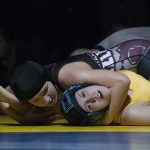 Hoquiam&rsquo;s Jenna Doll settles in to pin Aberdeen&rsquo;s MacKayla Waltee on Wednesday. (Brendan Carl | The Daily World)