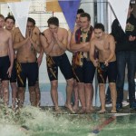(Brendan Carl | The Daily World) Teammates cheer on Aberdeen&rsquo;s Zachary Carpenter as he swims the 800 freestyle during the Aberdeen Relays on Wednesday.