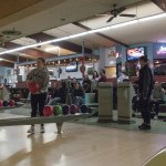 (Brendan Carl | The Daily World) Aberdeen Sydni Tingwell preps to bowl while her team looks on during practice Wednesday.