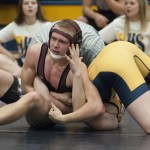 (Brendan Carl | The Daily World) Montesano&rsquo;s Tyler Izatt settles in to pin Aberdeen&rsquo;s Bodie Wharton during the 138-pound final on Saturday.