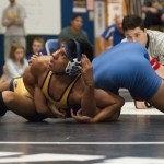 (Brendan Carl | The Daily World) Aberdeen&rsquo;s Edgar Salazar takes a peek at the clock during the 120-pound final against North Mason&rsquo;s Miguel Gaspar-Hernandez on Saturday.