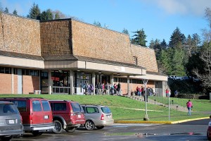 Students mill outside the front entrance of Hoquiam High School shortly after a lockdown caused by a student claiming to have a weapon around 11 a.m. Tuesday. School officials and Hoquiam Police located the 14-year old student; a search turned up no weapon. The student was arrested for malicious mischief for damaging a door as he exited the school. The lockdown was lifted before noon.
