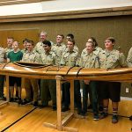 (Photo provided by Steve Holland) It took 19 months to construct the 17-foot kayak. Pictured from left are Scout Master Rex Angelovich, Peter Hamilton, Jed Western, Caleb Holland, Seth Angelovich, Tim Quigg, Carlos Cruz, Luke Hamilton, Marcus Anderson, Aidan Worlton, Terry Morris (obscured), Christopher Western, Marcus Pehl, Connor Bond and Sam Western.