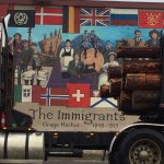 A logging truck is parked in front of a mural in Aberdeen. Many in the timber Washington timber industry voted for Donald Trump for president. (William Yardley/Los Angeles Times)