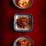 From top to bottom: Sliced horseradish kimchi, Chive kimchi, and cubed horseradish kimchi prepared at Jin Mi. (Kevin German/Sacramento Bee)