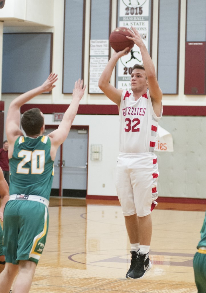 (Brendan Carl | The Daily World) Hoquiam&rsquo;s Jace Varner shoots a 3-pointer against Tumwater on Friday.