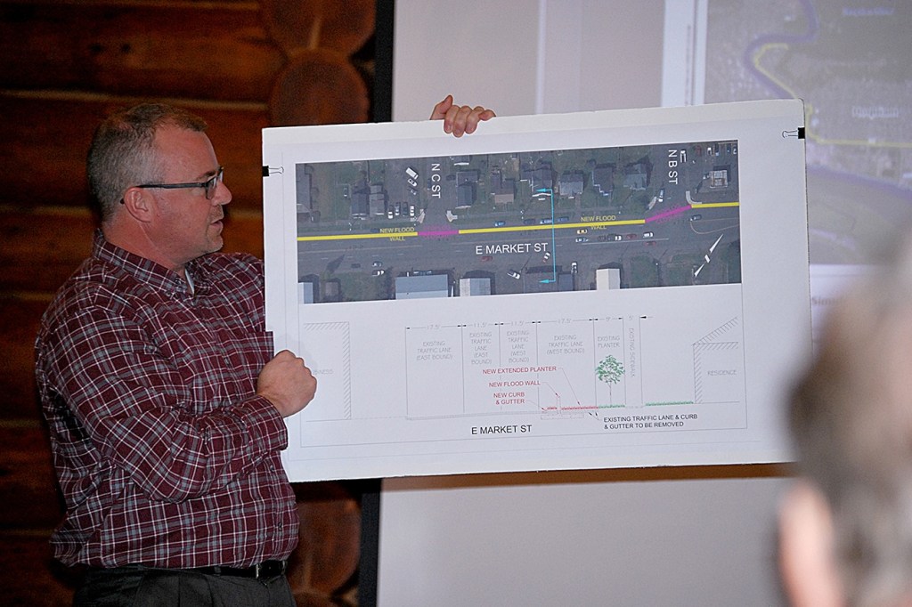 Mark R. Steepy, Managing Principal of KPFF Consulting Engineers in Lacey, shows an illustration of the primary preferred alignment for the North Shore Levee in the area of East Market Street in Aberdeen. The yellow line shows the location of the concrete barrier, the pink lines show the locations of &ldquo;stoplog closures,&rdquo; which are normally open areas in the levee that can be closed with temporary walls when flood risk is imminent.