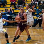 (Brendan Carl | The Daily World) Montesano&rsquo;s Shayla Floch drives between two Aberdeen defenders on Tuesday.