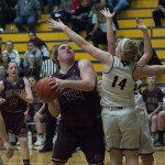 (Brendan Carl | The Daily World) Montesano&rsquo;s Jordan Spradlin works around Aberdeen&rsquo;s Mari Rabung on Tuesday.
