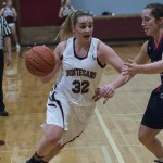 (Brendan Carl | The Daily World) Montesano&rsquo;s Shayla Floch tries to drive around a Black Hills defender on Tuesday.